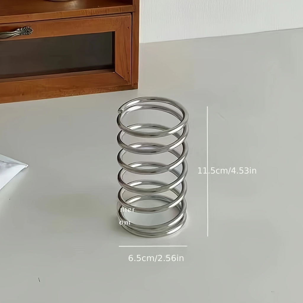 Spring Toothbrush holder