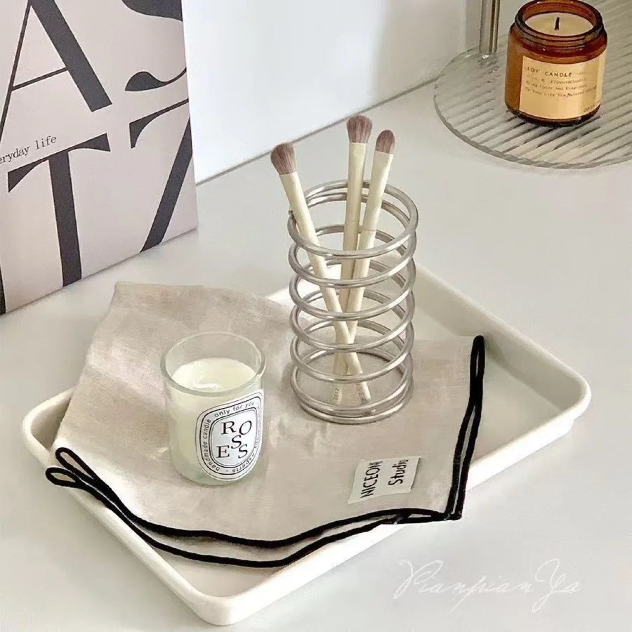 Spring Toothbrush holder